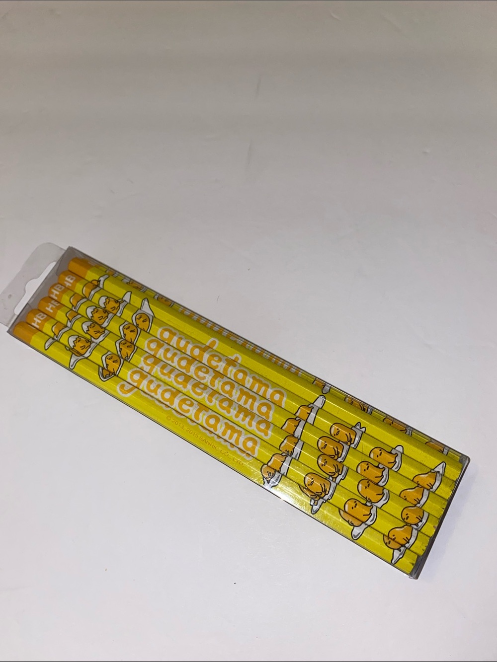 12 Pack Sanrio Gudetama Wooden Hb Pencil Hexagon With Eraser